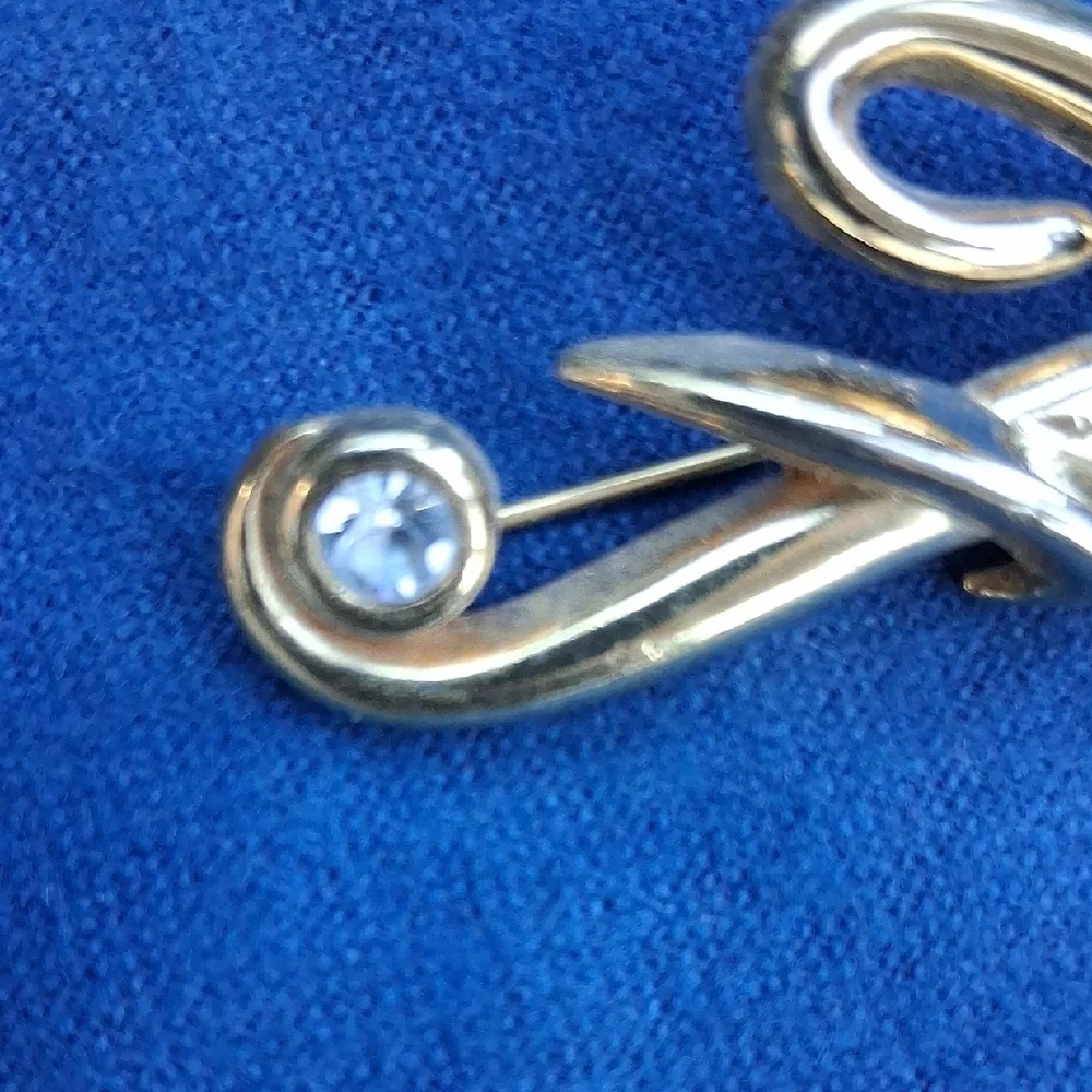 Monet Gold-Tone Script 'F' Brooch with Clear Stone